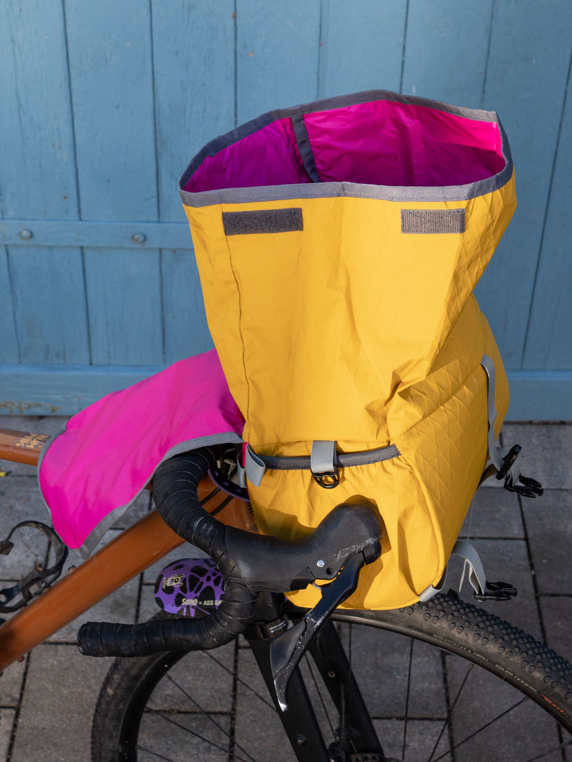 Small handlebar bag made from recycled X-Pac® RX30 in gold